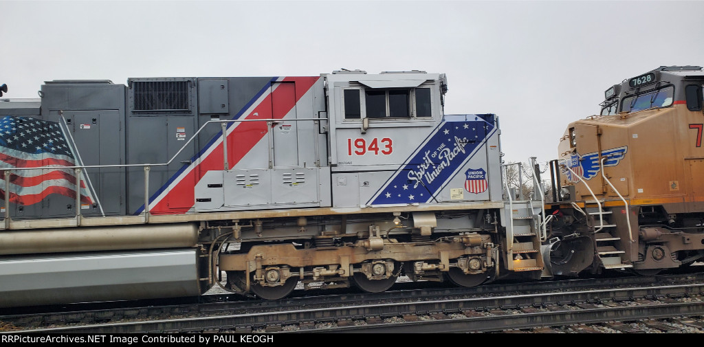 Side Shot of UP 1943 As She Passes Me By Heading to The Ice House Yard As A Light Power Consist.